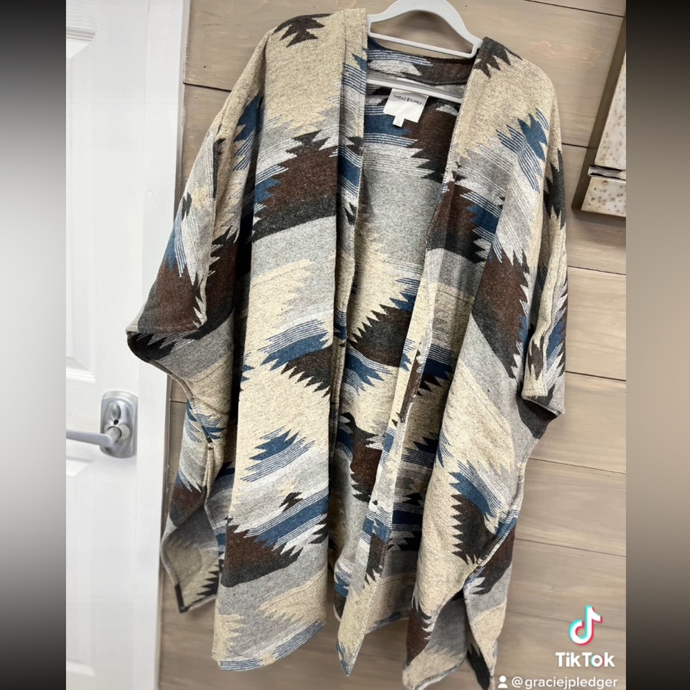 thread and supply poncho